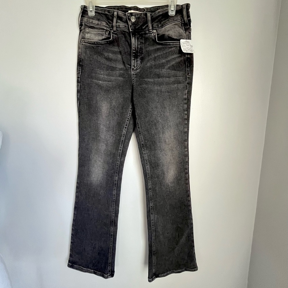We The Free black denim jeans.